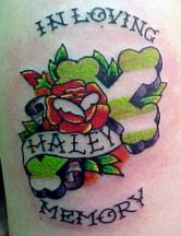 Cross with rose tattoo