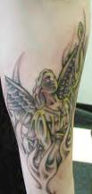 Blonde hair angel tattoo