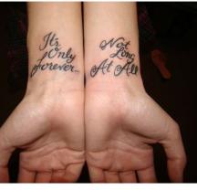 wordy wrist tattoo photos.JPG